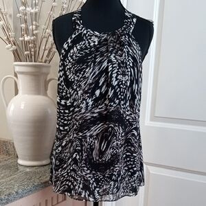 Ann Taylor Black and White Asymmetrical Sleeveless Top. Size 10